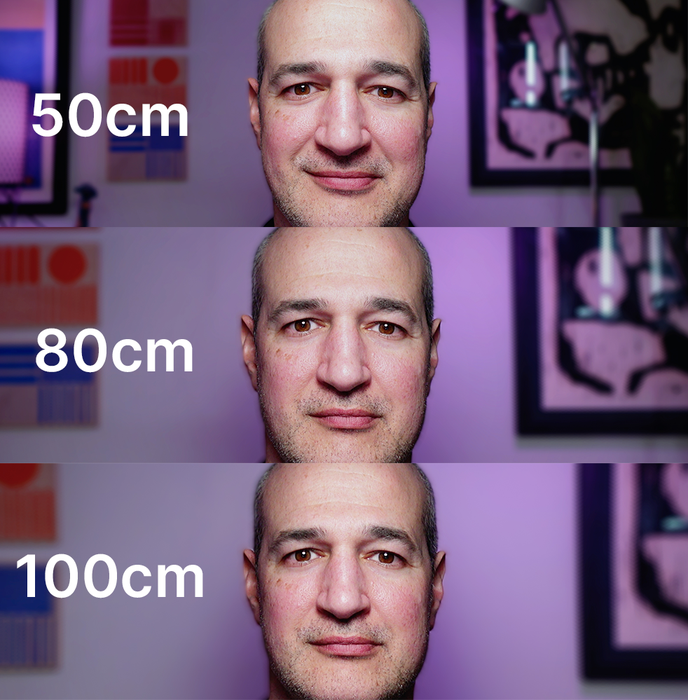 In this sequence, I'm looking at the same spot on the screen - about two inches below the camera lens - from three different distances. Note how my eyeline moves closer to direct as I move further back. I used Camo's Zoom feature to keep the same framing for my face, while moving my key light - a swing arm lamp - with me each time. In this sequence, I'm looking at the same spot on the screen - about two inches below the camera lens - from three different distances. Note how my eyeline moves closer to direct as I move further back. I used Camo's Zoom feature to keep the same framing for my face, while moving my key light - a swing arm lamp - with me each time.
