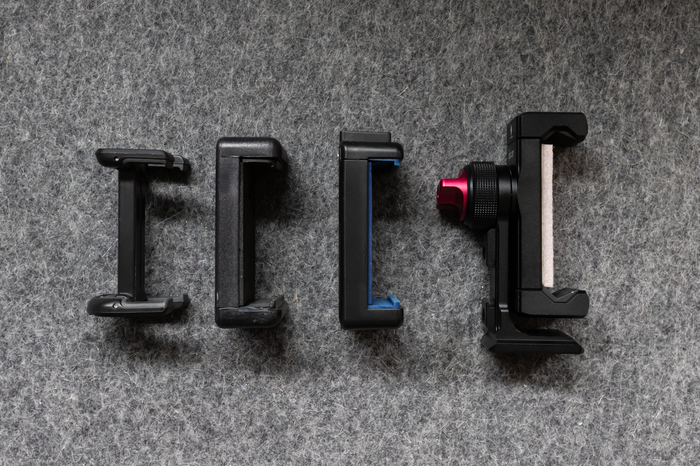  Claw-type phone holders can vary widely in size and build quality. From the left: the folding Joby GripTight One mount, the Tarion phone holder (bundled with the floating arm mount), the Elgato phone grip (bundled with the Mini Mount) and the Ulanzi ST-27. 