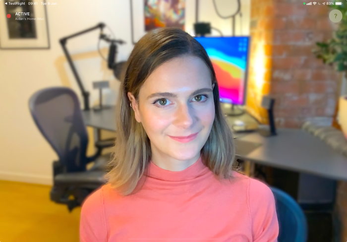 Camo used with a three point lighting system, with two lights either side of the camera and the light from a separate computer setup as the backlight.