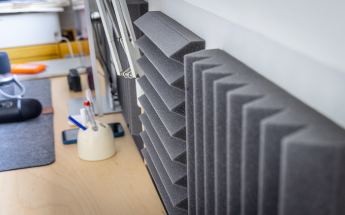 Acoustic foam is light, and easily mounted with double-sided tape or a spray-on adhesive