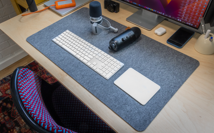 When it comes to desk pads, the thicker the better. There are plenty of inexpensive options out there, but be sure to read the reviews. Any option that remains wrinkled and refuses to lie flat is likely a bit too flimsy to be very effective.